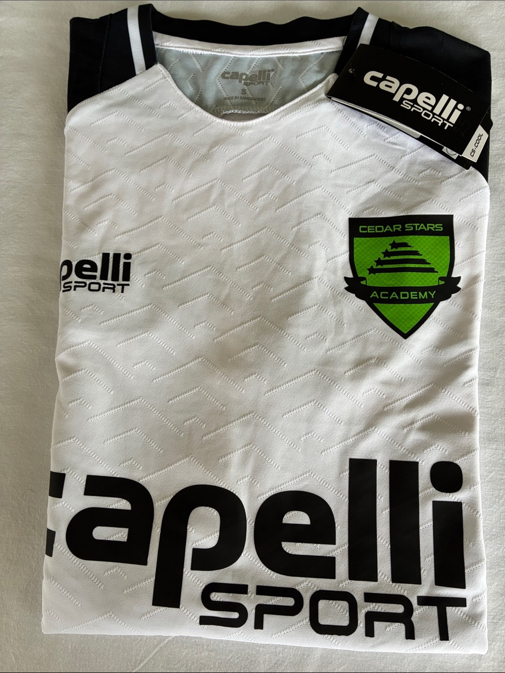 Capelli of New York White and Black Men’s Soccer Jersey with Green Crest